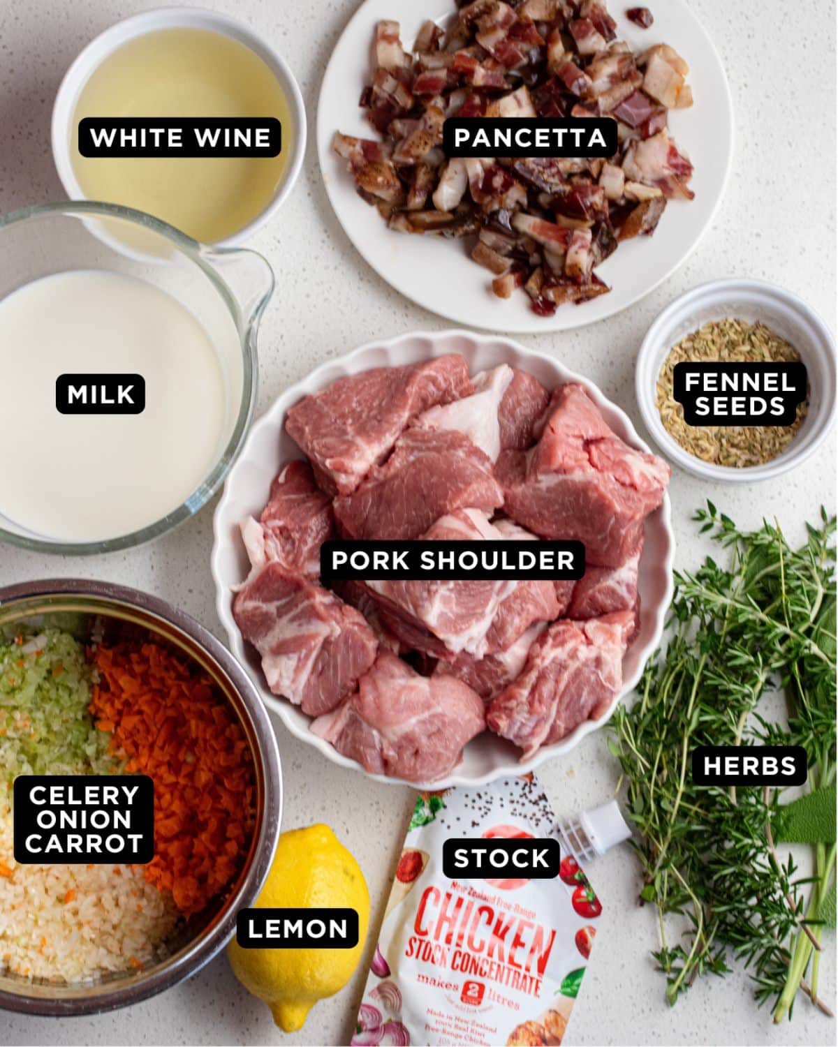 Ingredients laid out on a white bench top.