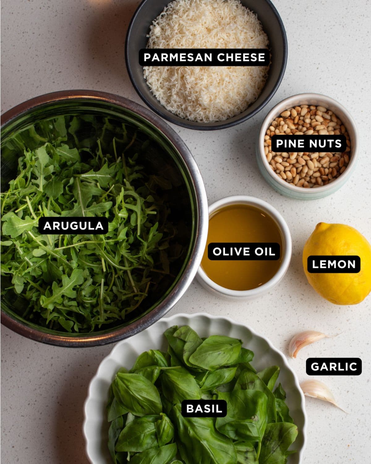 Ingredients on a white bench top.