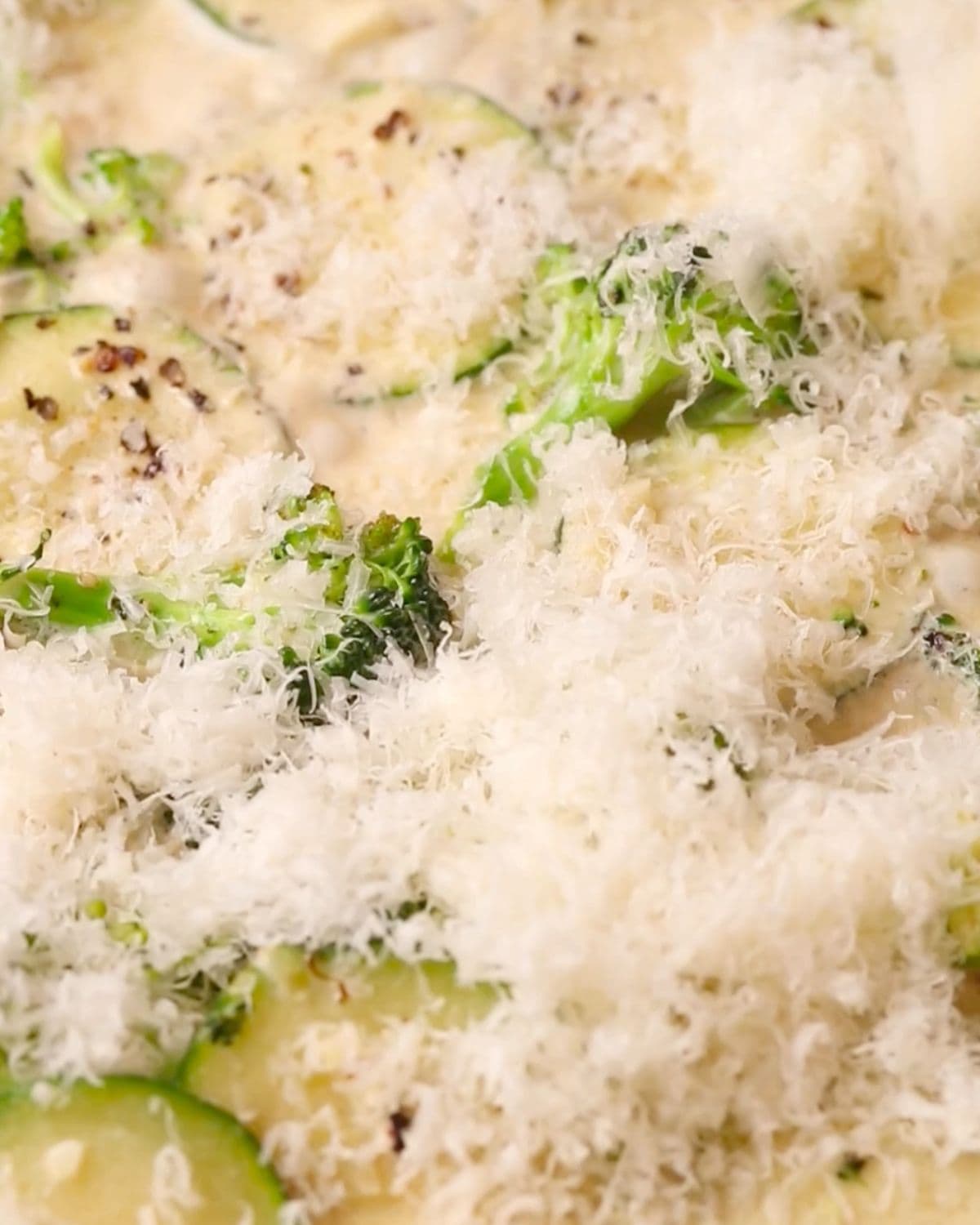 Grated parmesan sprinked on top of the creamy vegetables.