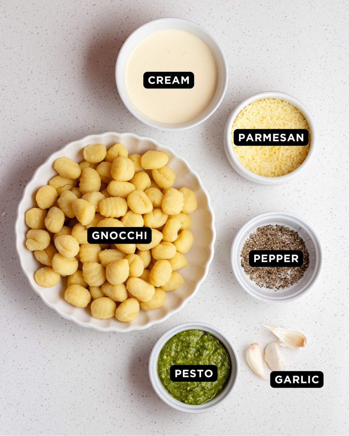 Ingredients on a white bench top.