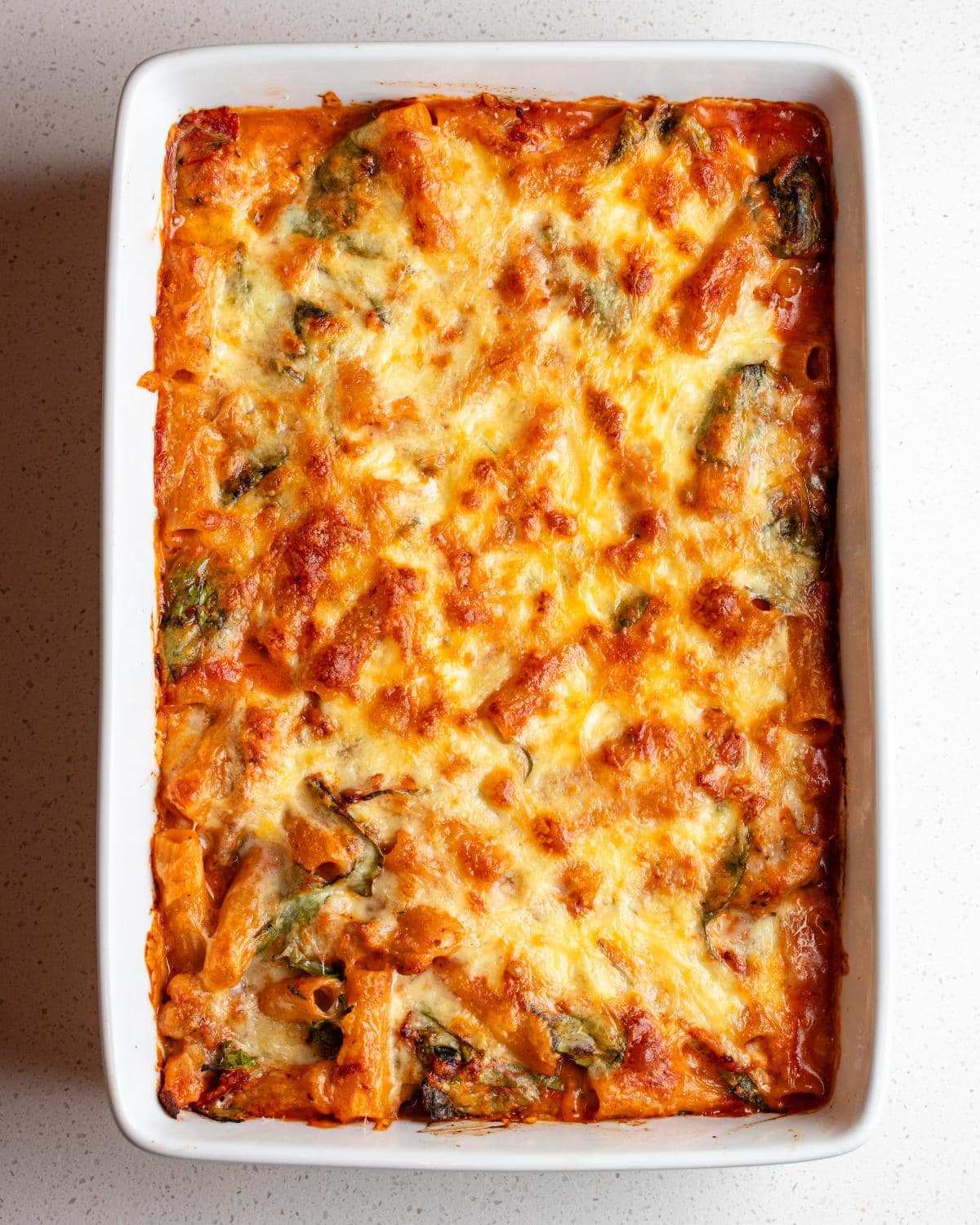 Cooked pasta bake with a golden brown top.