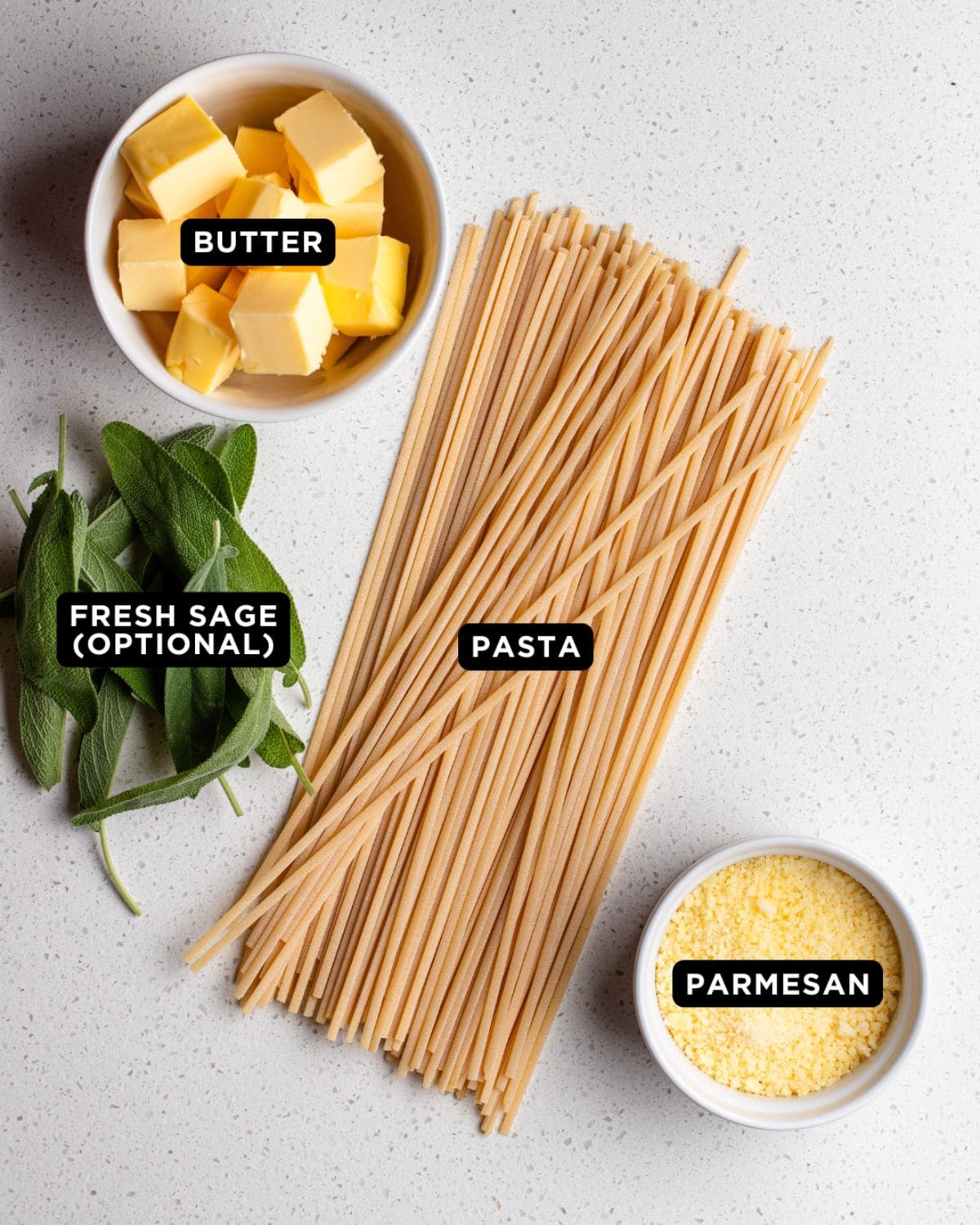 Ingredients on a white bench top.