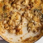 A round casserole dish with french onion mac and cheese.