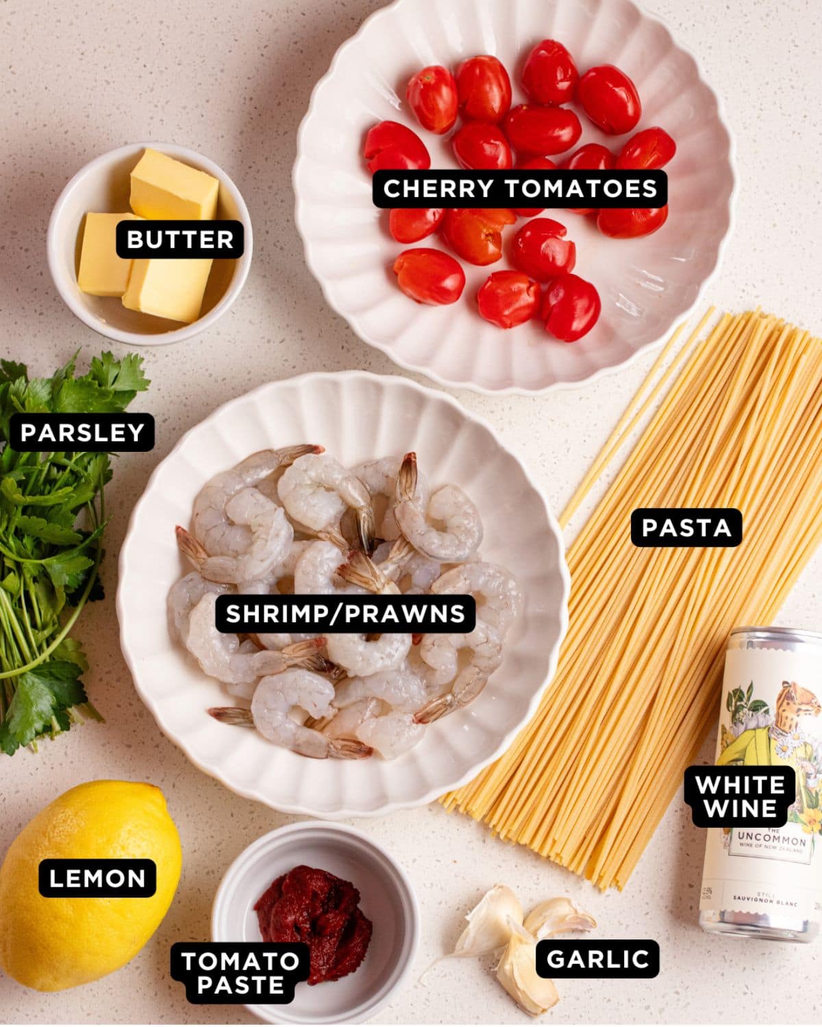 Ingredients on a white bench top.