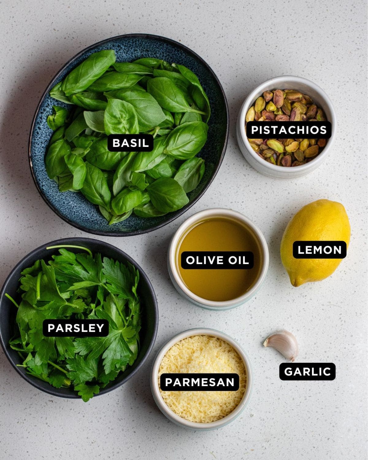 Ingredients on a white bench top.
