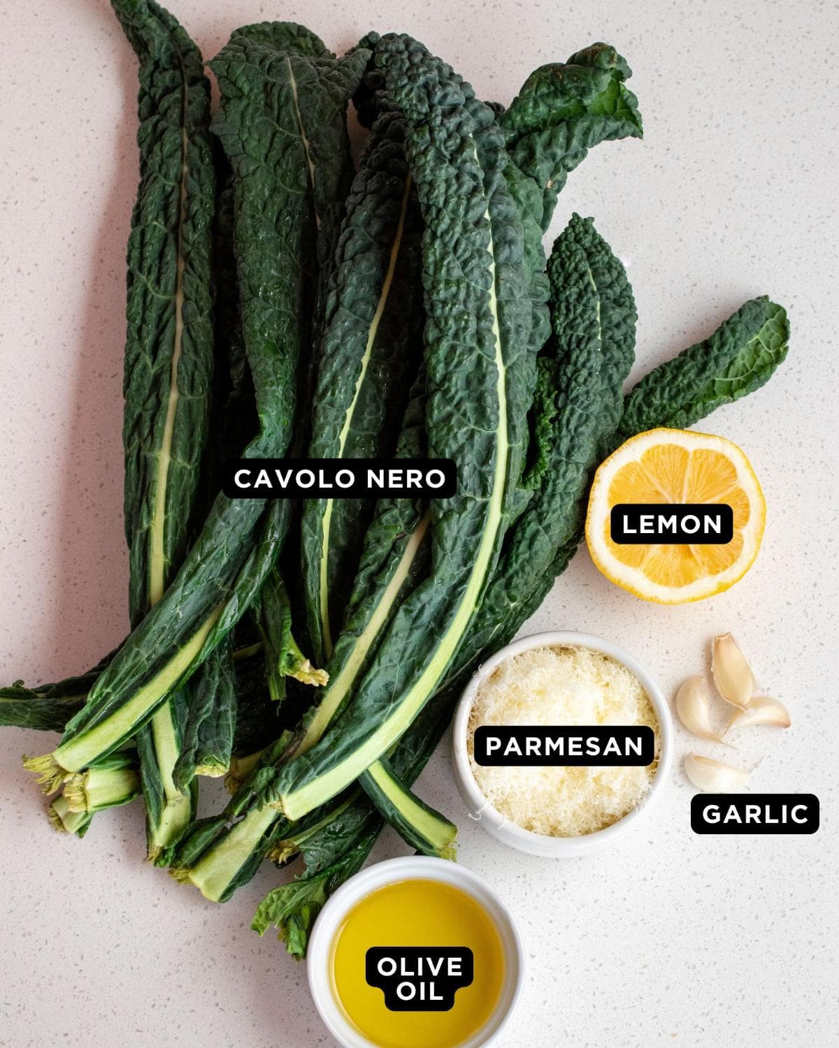 Ingredients on a white bench top.